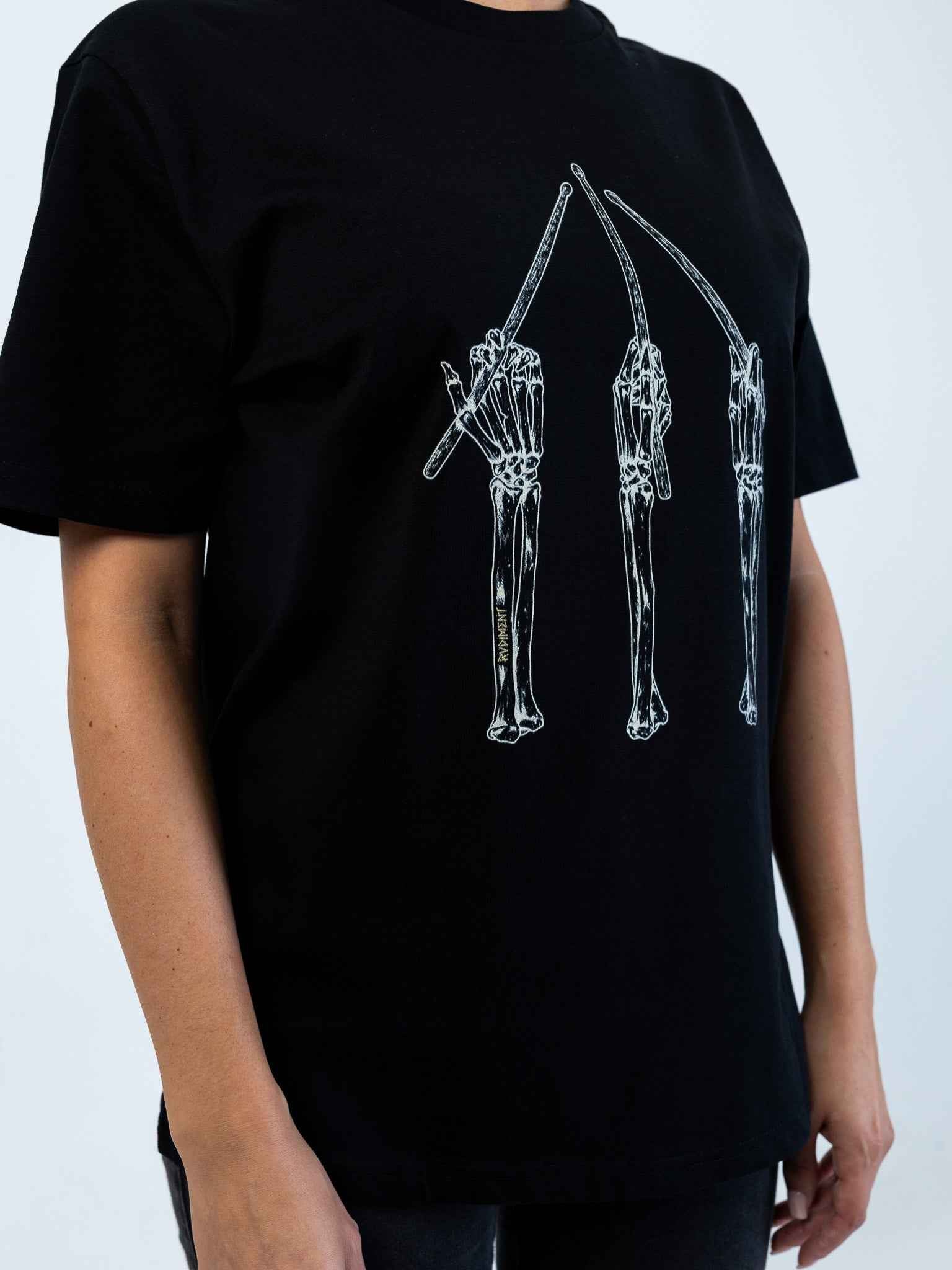 Drumstick Grips Unisex T-Shirt for Drummers - Model Side View Close-Up | RVDIMENT Drummer Apparel