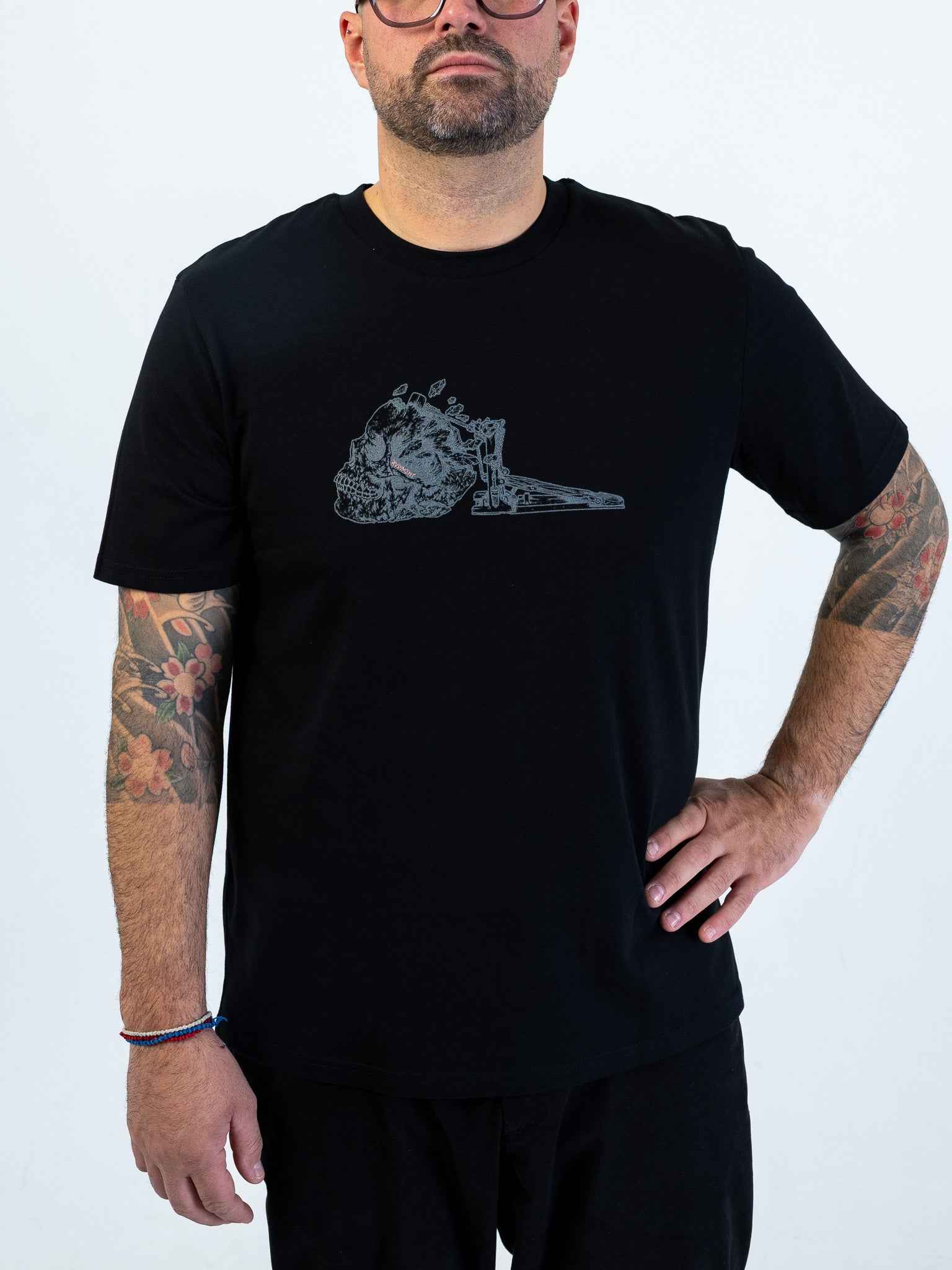 Kick Drum Skull Unisex T-Shirt for Drummers - Model Front View Close-Up | RVDIMENT Drummer Apparel