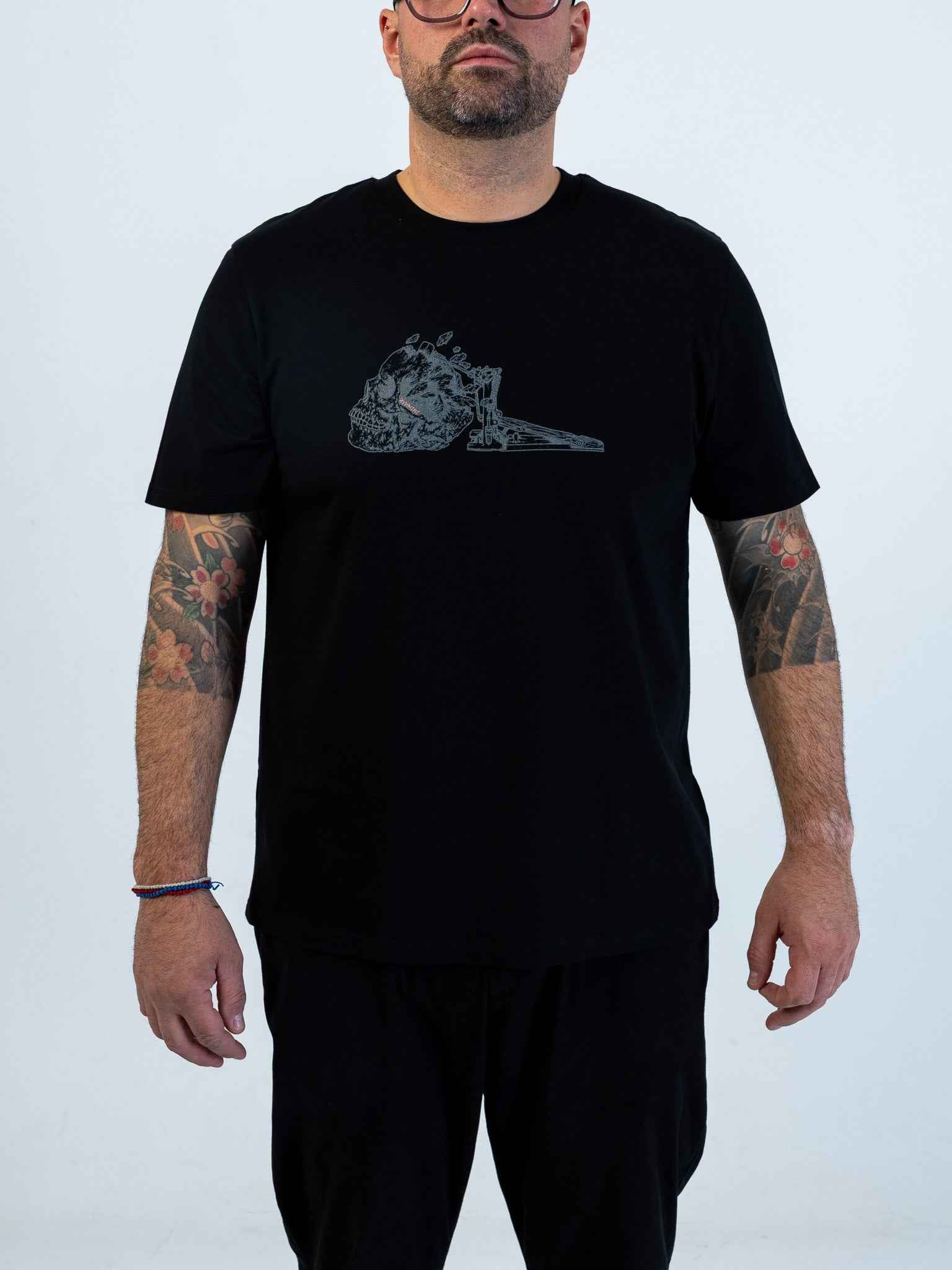Kick Drum Skull Unisex T-Shirt for Drummers - Model Front View | RVDIMENT Drummer Apparel