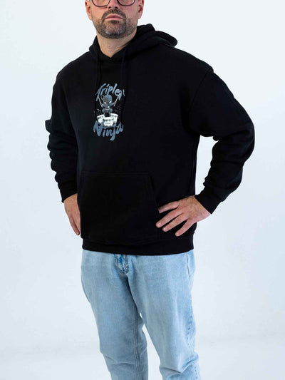 Triplet Ninja Hoodie for Drummers - Oversized Unisex Fit - Model Side View | RVDIMENT Drummer Apparel
